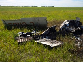 The Transportation Safety Board released photos of wreckage from a plane crash that killed two people Friday morning.