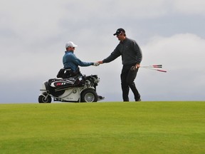 Injured veteran Michael Feyko, right, is now a golf professional and helps other vets use the sport as part of their healing. Michael Feyko/Twitter