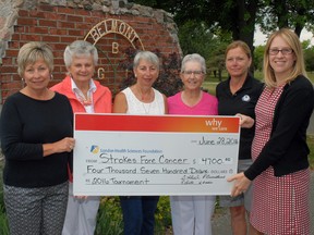 Shannon Digby, right, London Health Science Centre development officer for community events, accepts a $4,700 cheque from Belmont Ladies League members Barb Abel, left, Phyllis Broadhead, Terry Collins and Ruby Leverton. With them is club manager Sue Todd. The funds were raised through the league's Strokes Fore Cancer event and will be used in breast cancer research.