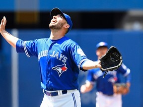 Blue Jays starting pitcher Marco Estrada calls for a pop fly on Saturday against the Indians. (THE CANADIAN PRESS/PHOTO)