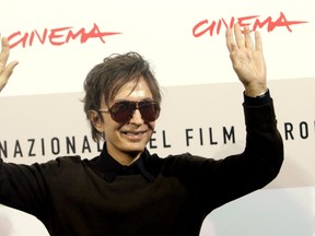 In this Oct. 28, 2008 file photo, director Michael Cimino arrives at the third edition of the Rome Film Festival, in Rome.  Cimino, whose film "The Deer Hunter" became one of the great triumphs of Hollywood's 1970s heyday, and whose disastrous "Heaven's Gate" helped bring that era to a close, has died. Los Angeles County acting coroner's Lt. B. Kim told The Associated Press that Cimino died Saturday, July 2, 2016,  at age 77. He said Cimino had been living in Beverly Hills but did not yet have further details on the circumstances of his death.(AP Photo/Andrew Medichini, File)