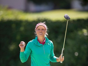 Brooke Henderson of Smiths Falls celebrates after winning an LPGA tournament in Portland, Ore., on Sunday. (The Associated Press)