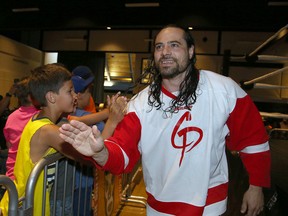 Mark Bartolucci, AKA Torado, greets fans during a Rock Solid Wrestling event at the Caruso Club in Sudbury on July 9, 2015. Wrestlers will open the Sudbury Italian Festival for the seventh straight year on Thursday with a full card. All money from ticket sales will support the Sudbury Playground Hockey League. Gino Donato/The Sudbury Star/Postmedia Network