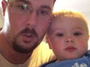 Corby Stott, shown here with one of his sons, died in hospital after an altercation in the Midland Walmart parking lot July 2, 2016. (Facebook photo)