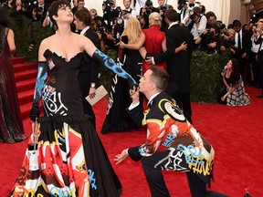 Katy Perry and Jeremy Scott attend the "China: Through The Looking Glass" Costume Institute Benefit Gala at the Metropolitan Museum of Art on May 4, 2015 in New York City.  Larry Busacca/Getty Images/AFP