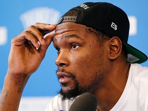 Oklahoma City's Kevin Durant (35) speaks during a news conference at the team's practice facility in Oklahoma City, Wednesday, June 1, 2016. (Nate Billings/The Oklahoman via AP)
