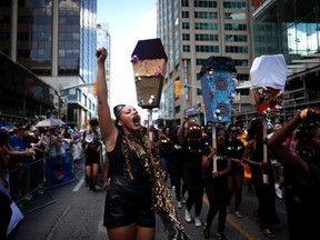 Members of Black Lives Matter Toronto take part in the annual Pride Parade. (THE CANADIAN PRESS)