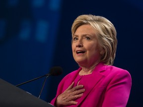 Democratic presidential candidate Hillary Clinton addresses the National Education Association (NEA) Representative Assembly in Washington, Tuesday, July 5, 2016. (AP Photo/Molly Riley)