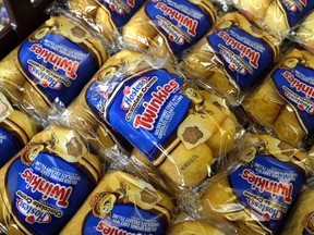 In this Nov. 16, 2013, file photo, Twinkies baked goods are displayed for sale at the Hostess Brands' bakery in Denver. Almost four years after seeking bankruptcy protection under a barrage of labor issues and rapidly changing appetites, the maker of Twinkies and Ding Dongs will take the stage once again as a publicly traded company Tuesday, July 5, 2016. (AP Photo/Brennan Linsley, File)