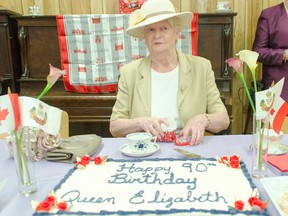 Seeing red was pretty much all one could see in the basement of the Lucknow Town Hall as the Lucknow Sepoy Ranees, the local Red Hat Society, held a birthday tea for Queen Elizabeth II who turned 90 on April 21, 2016. Pictured: Lady Patricia Tait-Morris was the afternoon’s honourary guest who acted on the Queen’s behalf and cut her Majesty’s birthday cake.