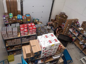 Whitecourt Food Bank volunteers Nicole Chabot and Laura Kraft clean the warehouse after operations on June 22 finish. Every available surface is utilized in the warehouse, as storage is precious. At the Community Services Advisory Board's annual planning session in April, researching additional storage possibilities for the Food Bank was identified as a top priority for the 2017 budget. Hannah Lawson | Whitecourt Star