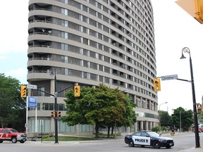Sarnia police closed off a stretch of George Street, between Christina and Vidal streets, Tuesday for several hours to deal with a woman in distress at the Kenwick Place. Police gave the all-clear and reopened the street late Tuesday afternoon. (Barbara Simpson/Sarnia Observer/Postmedia Network)
