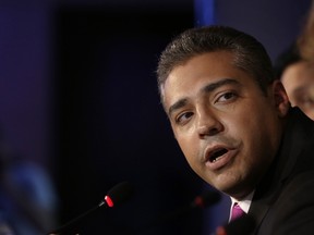 This May 11, 2015, shows Al-Jazeera English's former acting bureau chief, Canadian-Egyptian journalist Mohammed Fahmy, speaking during a press conference in Cairo, Egypt. AP Photo/Hassan Ammar, File)