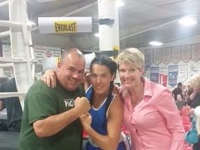 Sudbury's Trish Teale (middle) poses with her uncle Jake and aunt Jen following an exhibition bout in Kingston recently. Teale will have her first official fight this Saturday in Sudbury. Supplied photo