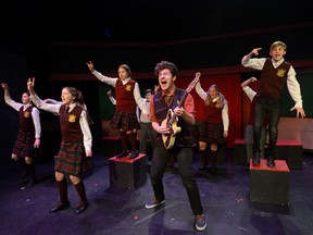 Actor Jack Phoenix, centre with guitar, plays Dewey Finn in the Original Kids production of School of Rock-The Musical. (MORRIS LAMONT, The London Free Press)