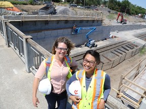 Jason Miller/The Intelligencer
Ashley Baxter and Li-lian Lui are two women paving there way to the top in the male dominated construction industry. The two Toronto Zenith employees are part of a team engineering the replacement of the Bay Bridge Road CP overpass.