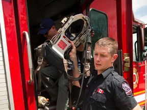 Craig Lester of GlobalFire, a charity that distributes used fire gear to developing nations, says a recent London Fire Department donation of decommissioned breathing apparatus, air cylinders and communication equipment is the largest yet handled by the group. (MIKE HENSEN, The London Free Press)