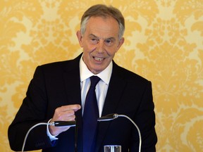 British former prime minister Tony Blair holds a press conference at Admiralty House, London, after retired civil servant John Chilcot presented The Iraq Inquiry Report on Wednesday, July 6, 2016. Blair said he takes full responsibility for the decision and that the British military and civil service are not to blame for the problems that developed after the U.S.-led invasion of Iraq in 2003. (Stefan Rousseau/Pool via AP)