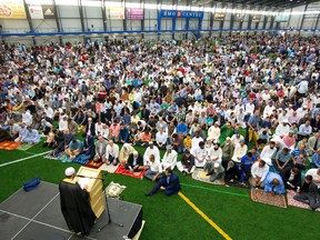 Thousands of London's Muslim population gathered to pray and listen to a message from London Mosque imam Abd Alfatah Twakkal at the BMO Centre in London, Ont. on Wednesday July 6, 2016 at the end of the month of Ramadan and the celebration of Eid. (MIKE HENSEN, The London Free Press)