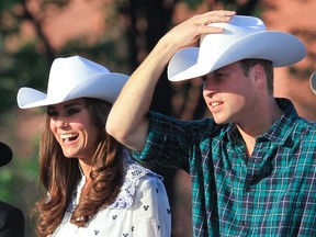 The Duke and Duchess of Cambridge, Prince William and Catherine are all smiles with cowboy hats at the Calgary Stampede at the BMO Centre in Calgary, Alberta on  July 7 2011.  The newlywed royal couple are touring parts of Canada on their first official visit abroad and are spending a total of 9 days in Canada. (ANDRE FORGET/QMI AGENCY)