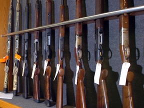 A rack of "long guns" and rifles at a gun store in Calgary, Alberta. FILE PHOTO