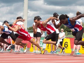 Sprint phenom Andre De Grasse, second from right, takes his start to go on to win the gold medal in the men's 100 metre at the Canada Games on August 15, 2013 in Sherbrooke, Quebec. THE CANADIAN PRESS/Paul Chiasson