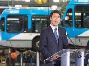 Prime Minister Justin Trudeau makes an infrastructure announcement at a municipal bus depot in Montreal, on Tuesday, July 5, 2016. (THE CANADIAN PRESS/Ryan Remiorz)