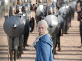 This file publicity image released by HBO shows Emilia Clarke as Daenerys Targaryen in a scene from "Game of Thrones."  (AP Photo/HBO, Keith Bernstein, File)