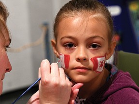 Heather Hildebrant gets into the Canada Day spirit at Annandale National Historic Site. (CHRIS ABBOTT/TILLSONBURG NEWS)