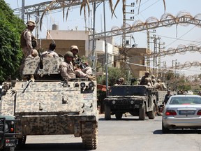 Lebanese army soldiers from the special forces unit patrol Qaa, a predominantly Lebanese Christian village near the Syrian border were suicide bombers blow themselves among civilians on Monday, eastern Lebanon, Tuesday, June 28, 2016. Lebanese troops detained 103 Syrians for illegal entry into the country, in a security sweep on Tuesday, a day after a series of deadly bombings struck a village near the border with Syria, the military said. The unprecedented attacks nine explosions in all, eight of them suicide bombings triggered fear and panic among residents of Qaa village and a deepening sense of foreboding in Lebanon, which has grappled for over five years with spillovers from neighboring Syria's civil war. (AP Photo)