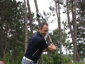 Bruce Heidman/Postmedia Network  Former Sudbury Wolves captain and current Florida Panthers captain Derek MacKenzie tees off at the Idylwylde on Thursday for the sixth edition of his Hats for Heros charity golf tournament.