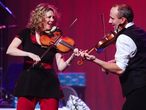 Clifford Skarstedt/Postmedia Network
World-acclaimed fiddlers and multiple Juno Award winners Natalie MacMaster and Donnell Leahy perform A Celtic Family Christmas during one of three sold-out gigs in December 2014.