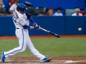 Toronto Blue Jays Josh Donaldson makes a 2-base hit vs. Detroit Tigers  at the Rogers Centre in Toronto, Ont. on Thursday July 7, 2016. (Dave Thomas/Toronto Sun/Postmedia Network)