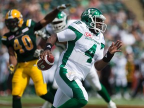 Saskatchewan Roughriders quarterback Darian Durant (4) runs the ball against the  Edmonton Eskimos during pre--season CFL action at Commonwealth Stadium on June, 18 2016  in Edmonton. Greg Southam / Postmedia Network