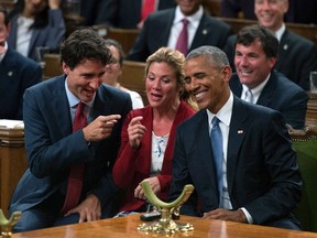 Canada's Prime Minister Justin Trudeau and his wife Sophie Gregoire Trudeau share a laugh with U.S. President Barack Obama after his address to Parliament in the House of Commons on Parliament Hill in Ottawa on Wednesday, June 29, 2016. THE CANADIAN PRESS/Justin Tang
