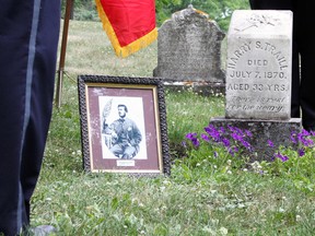 Harry Traill, the first peace officer post confederation to be killed in the line of duty in 1870, was honoured by the Correctional Service of Canada at his gravesite in the Cataraqui Cemetery in Kingston, Ont. on Thursday July 7, 2016. Steph Crosier/Kingston Whig-Standard/Postmedia Network
