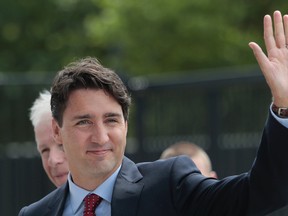 Canadian Prime Minister Justin Trudeau arrives at the NATO summit in Warsaw, Poland, Friday, July 8, 2016. Starting Friday, US President Barack Obama and leaders of the 27 other NATO countries will take decisions in Warsaw on how to deal with a resurgent Russia, violent extremist organizations like Islamic State, attacks in cyberspace and other menaces to allies' security during a summit described by many observers as NATO's most crucial meeting since the 1989 fall of the Berlin Wall.(AP Photo/Markus Schreiber)