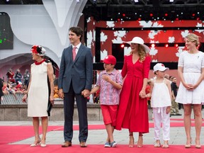 Prime Minister Trudeau, Sophie, Xavier and Ella-Grace arrive at the noon show celebrating Canada Day in Ottawa on Parliament Hill, July 1, 2016. Two of the prime minister's kids have popped up in a Facebook promotion for Joe Fresh using this PMO handout image from Flickr. THE CANADIAN PRESS/HO-Flickr-PMO, Adam Scotti