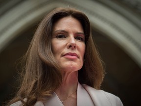 Christina Estrada, 54, leaves the High Court in London after she was awarded a £53 million cash settlement in a High Court divorce money battle with her Saudi billionaire ex-husband, Sheikh Walid Juffali, 61, on Friday, July 8, 2016. (Stefan Rousseau/PA via AP)