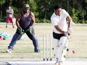 Batter Krishna Challagulla hits the ball during Big Nickel Cricket Club practice in Capreol, Ont. on Thursday July 7, 2016. The club is holding matches at it's field in Capreol this weekend.Gino Donato/Sudbury Star/Postmedia Network