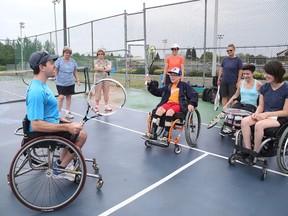Paralympian Joel Dembe held a tennis clinc with the Sudbury adaptive sports council at the James Jerome Tennis Courts in Sudbury, Ont. on Friday July 8, 2016. Gino Donato/Sudbury Star/Postmedia Network