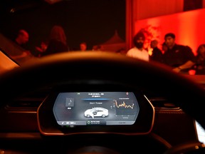 The new dashboard of Tesla 'D' model electric sedan is seen after Elon Musk, CEO of Tesla, unveiled the dual engine chassis of the new Tesla 'D' model, a faster and all-wheel-drive version of the Model S electric sedan, at the Hawthorne Airport October 09, 2014 in Hawthorne, California. The D will be able to accelerate to 60 miles per hour in just over 3 seconds. (Photo by Kevork Djansezian/Getty Images)