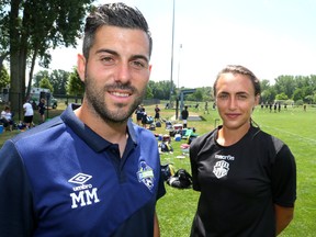 London FC head coach Mike Marcoccia is seen in this Free Press file photo with a player on his women's team, Jade Kovacevic. (MIKE HENSEN, The London Free Press)