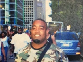 A photo provided by Dallas police shows open-carry activist Mark Hughes at a rally against excessive use of force by police, Thursday, July 7, 2016, in Dallas. Hughes told a television station that he was “defamed” by the Dallas Police Department, which tweeted the photo of him and described him as a suspect in the shootings of police officers. Hughes turned himself in to police, and was released a short time later. Another man, Micah Johnson, was later identified as the shooter who killed five officers. Johnson was killed in a confrontation with police. (Dallas police via AP)