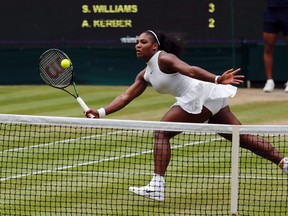 Serena Williams of the U.S returns to Angelique Kerber of Germany during the women's singles final on day thirteen of the Wimbledon Tennis Championships in London, Saturday, July 9, 2016. (AP Photo/Ben Curtis)