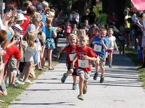 Children take part in the St. Clair River Run's Minnow Run in 2012. The race, which includes a five-kilometre run/walk, 10-kilometre run and a Minnow Run for kids, will take place on Saturday, July 16. (File photo/Postmedia Network)