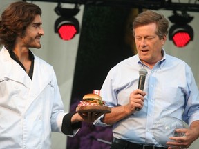 Mayor John Tory announced the peameal bacon sandwich as the city's signature dish during the Lovin' Local Food Fest on Saturday. (Terry Davidson/Toronto Sun/Postmedia Network)