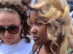 Lecent Ross' mother Alicia Jesquith (on right) speaks with the media Saturday afternoon