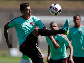 Portugal’s Jose Fonte controls the ball during a training session, on the eve of the Euro 2016 final soccer match between France and Portugal, at Marcoussis, south of Paris, France, Saturday, July 9, 2016. (AP Photo/Francois Mori)