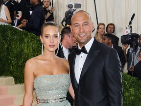 Hannah Davis and Derek Jeter attend the Metropolitan Museum of Art Costume Institute Gala - Manus x Machina: Fashion in the Age of Technology at the Metropolital Museum of Art on May 3, 2016. (WENN.COM)